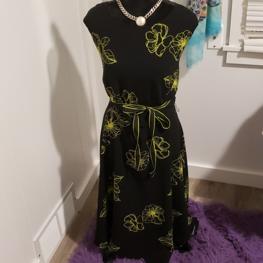 Black dress with neon green flower accents